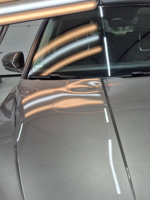 Hyundai Tucson,  herstel van een grote deuk in de motorkap,  in contourlijn